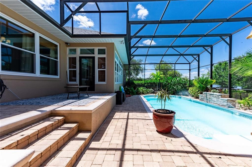 Pool patio area on upper deck.