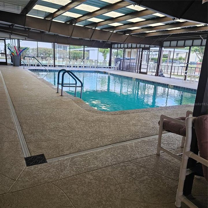 Covered heated pool by clubhouse