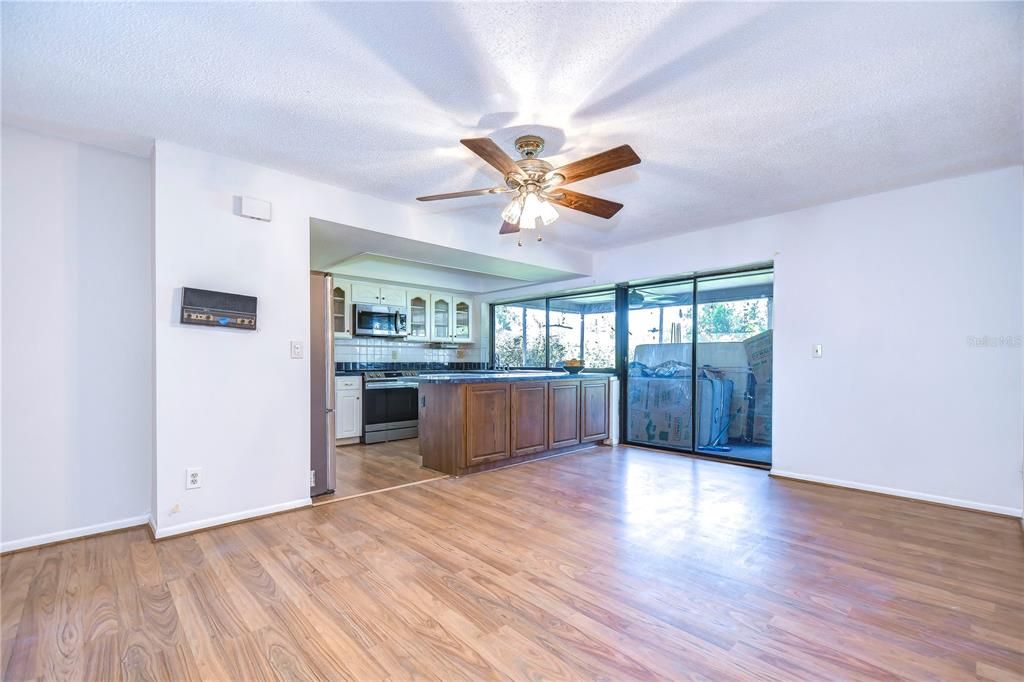 Spacious family room overlooking kitchen and backyard!