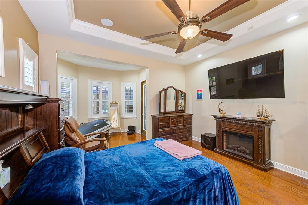 MASTER SUITE WITH GORGEOUS WOOD FLOORING; TRAY CEILINGS