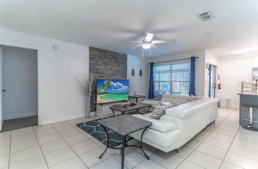 Tiled Flooring Throughout Main Area and Living Area.