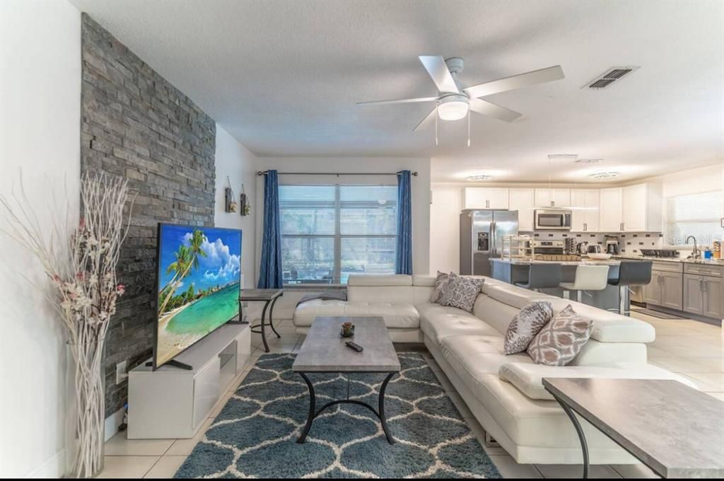 Comfortable Living Area Seating w/Access to The Pool Area and Pool View.