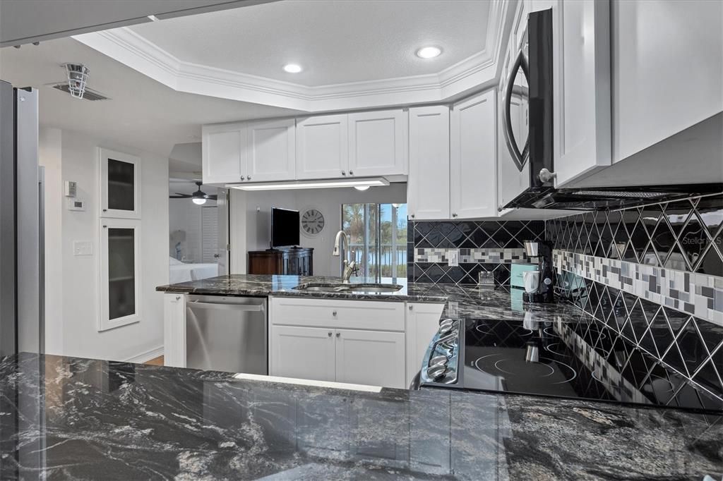 Kitchen with granite countertops.
