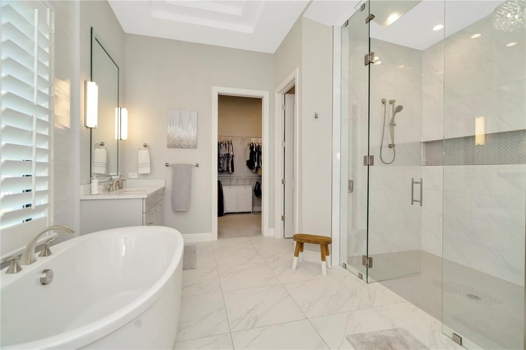 Owner's Bathroom with large shower and double vanities.