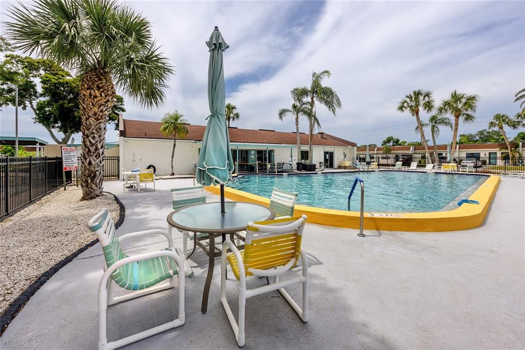 Plenty of Pool Seating with Umbrellas