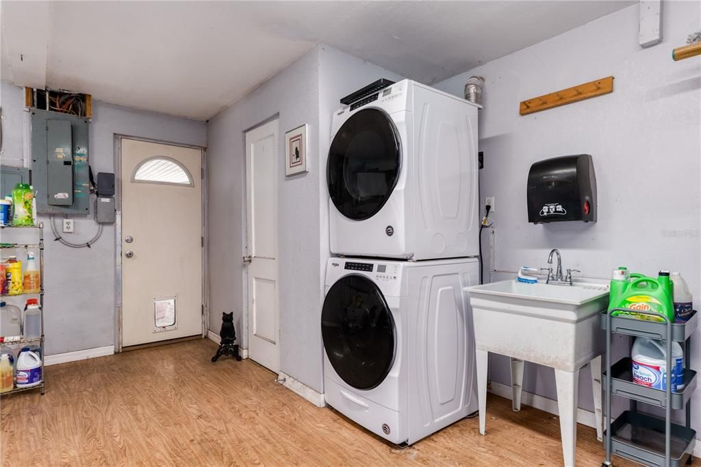 Large Interior Laundry Room just off Kitchen and Garage