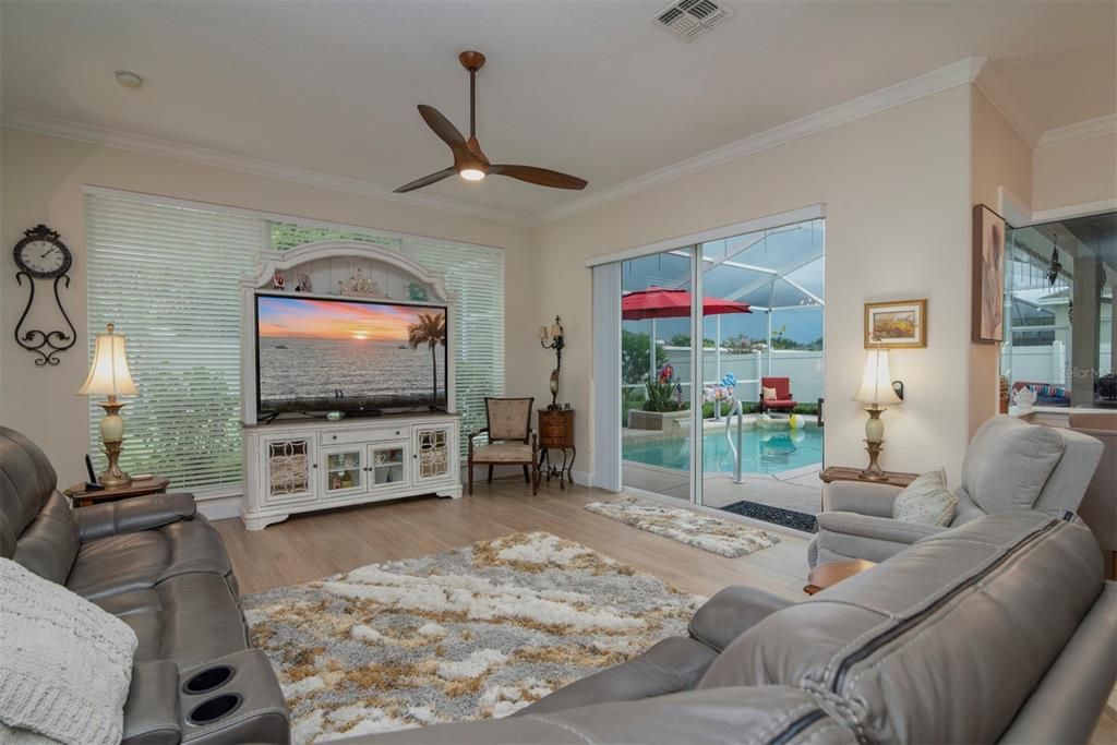 Family room overlooking pool and lanai