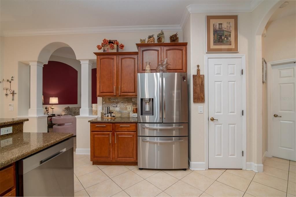 Large pantry and entrance to laundry and garage