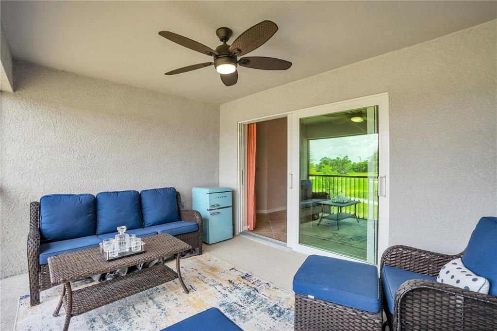 Golf view screened porch-ceiling fan.  All furniture seen is included.  Move right in and enjoy!