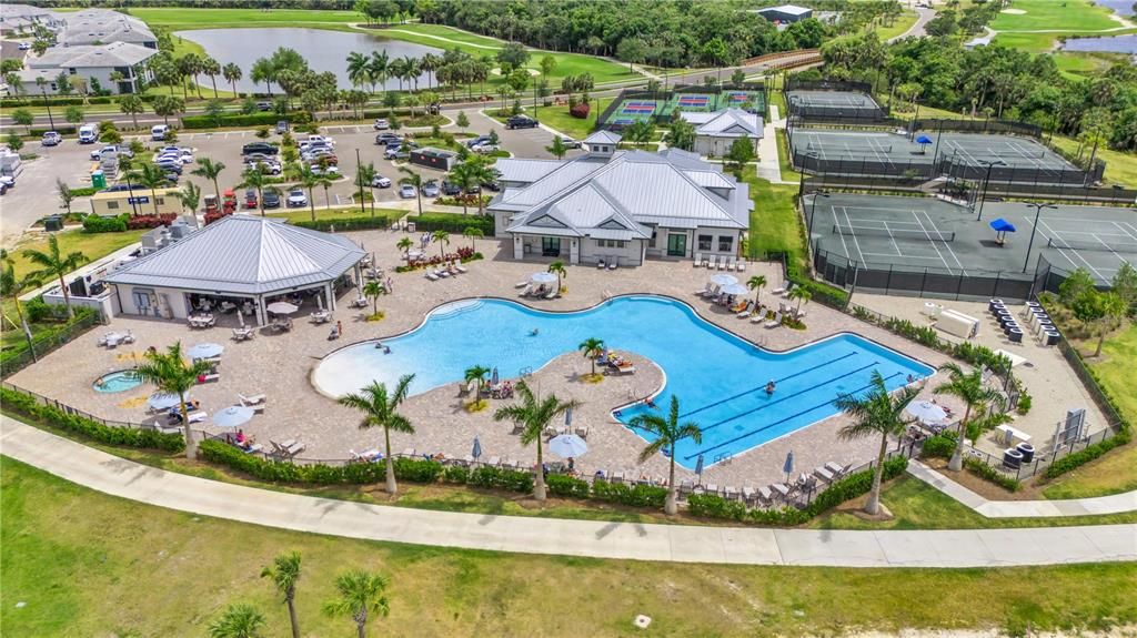 Main pool area features a hot tub,, clubhouse with Getaway Spa, State of the Art Fitness Center with Nautilus equipment & weight room, sauna. Enjoy a bote to eat and your favorite beverage at teh open air bar/restaurant.