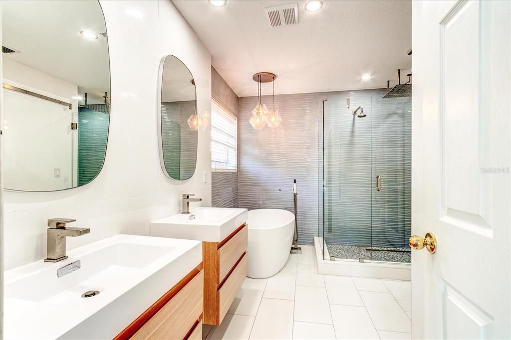 Primary bathroom completely remodeled by JWP Interiors