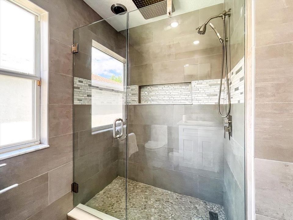 Gorgeous shower with additional rain shower head