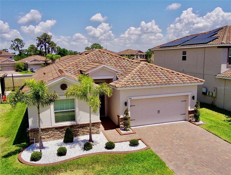 Beautiful home with Barrel Tile Roof!