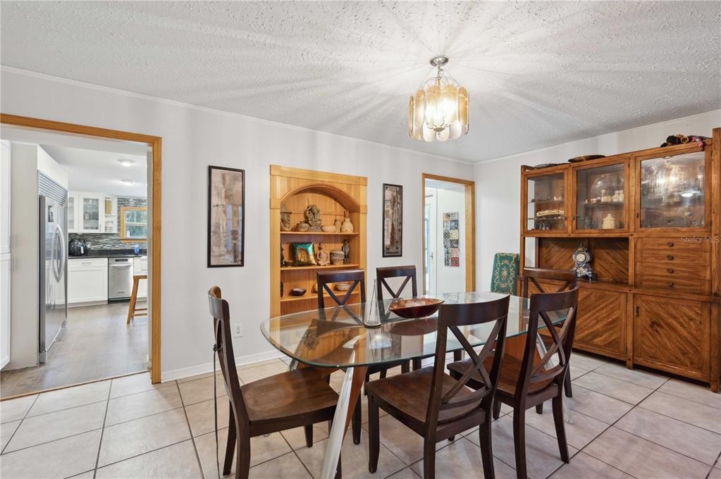 Dining room leading into kitchen