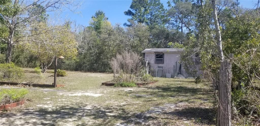 This shows the 1 Acre Parcel.  It has mature landscaping and its own LARGE Shed.  Fenced with own gate.  Beautiful peaceful area.