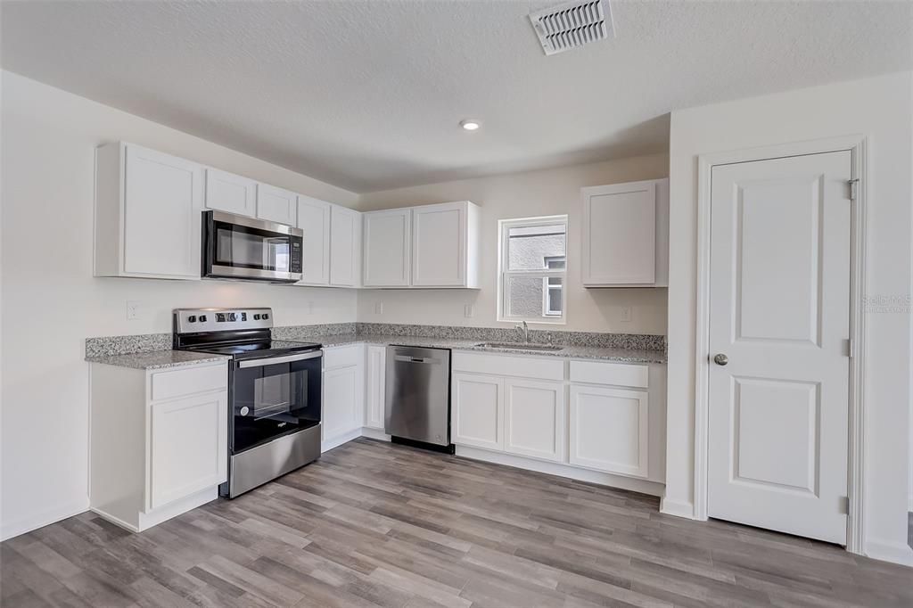 Photos are of a model home or artist rendering; any dimensions listed are approximate and may change. Home aspects and included items may vary and are not intended to form part of any contract or warranty. Home may be virtually staged.