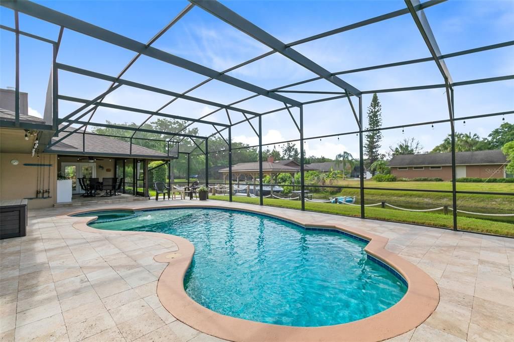 Screen Enclosed, In-Ground Heated, Saltwater Pool with Spa.