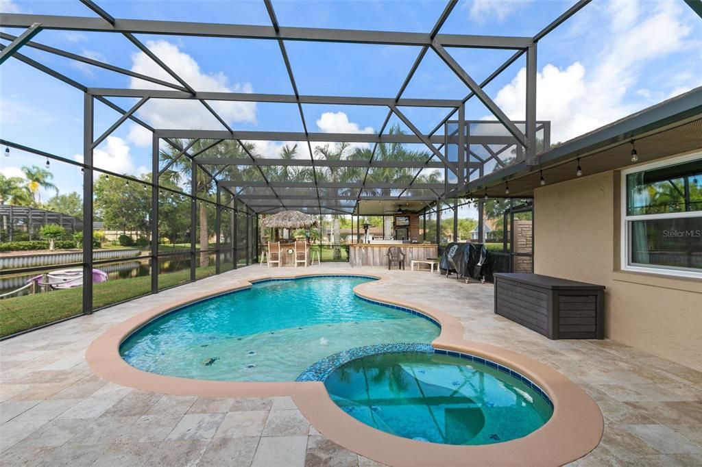 Screen Enclosed, In-Ground Heated, Saltwater Pool with Spa.