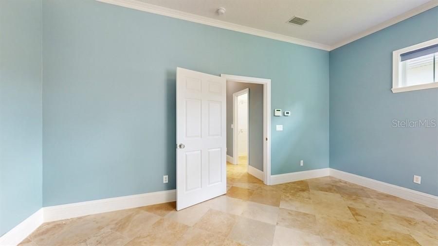 PRIMARY BEDROOM WITH DUAL WALK IN CLOSETS