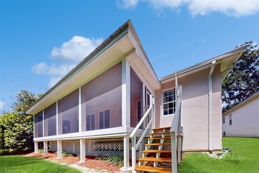 SPACIOUS SCREENED PORCH THAT OVERLOOKS CONSERVATION