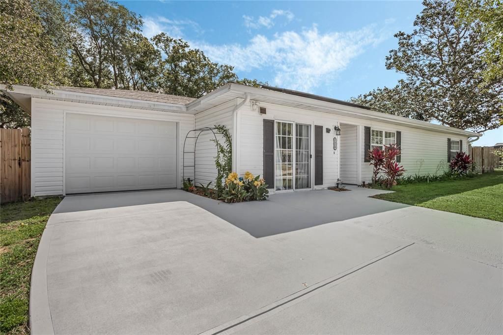 Winter Park POOL HOME at the end of a quiet CUL-DE-SAC on a large .30 ACRE LOT with a NEW ROOF (2022), UPDATED PLUMBING (2023), NEW IRRIGATION SYSTEM (2023), ADDED 1-CAR GARAGE (2023), NO HOA and OWNED SOLAR PANELS to keep energy bills low!