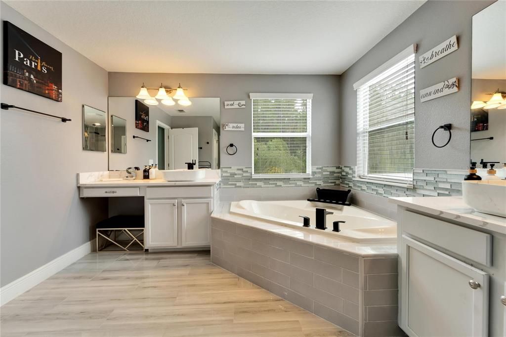 GREAT USE OF SPACE AND SEPARATE VANITIES WITH A VANITY SEAT IF NEEDED