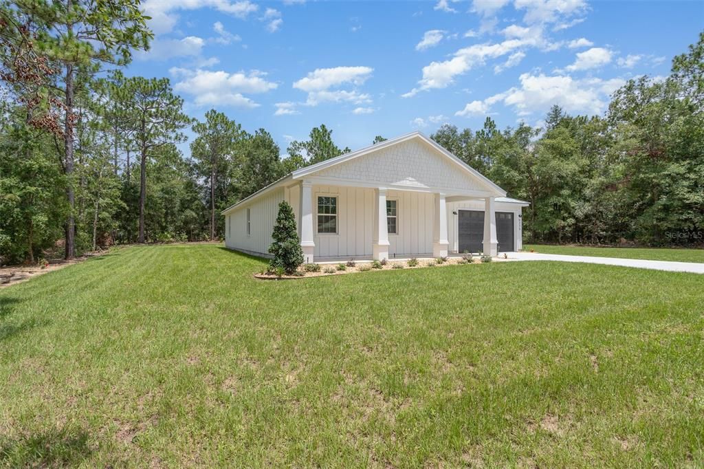 PHOTO OF FULLY COMPLETED MODEL HOME - SAME FLOOR PLAN