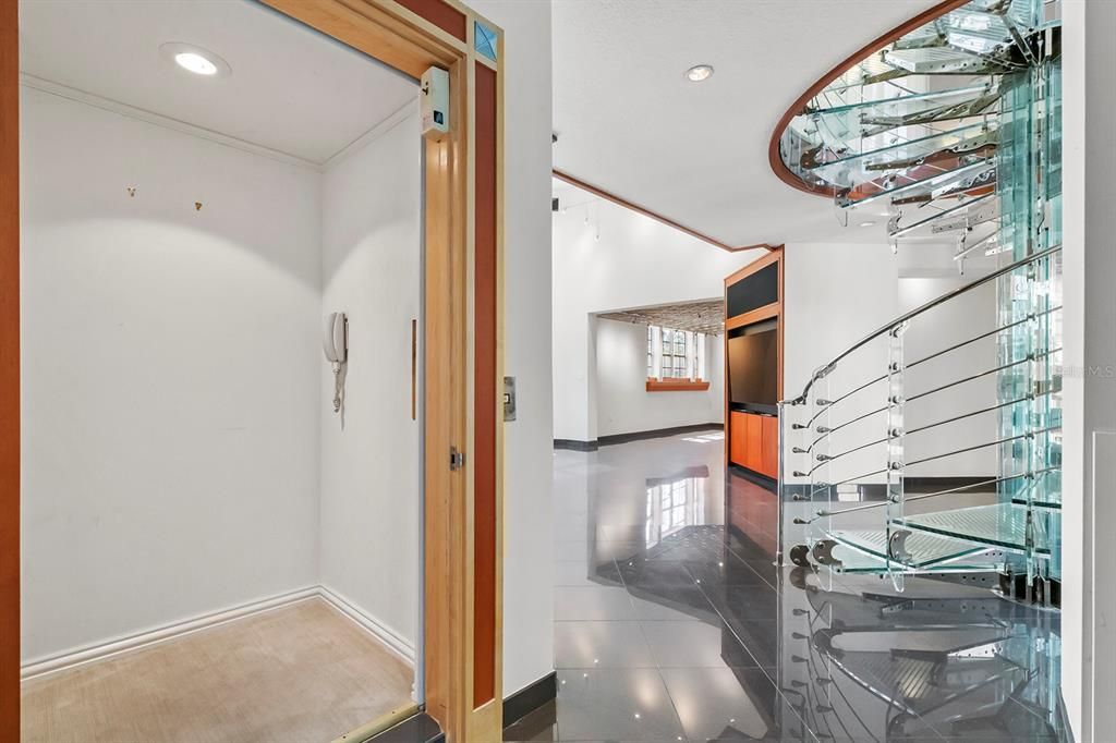 In-unit Elevator / Glass Staircase