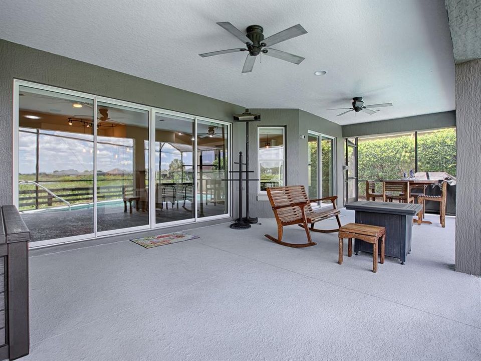 FROM THE LIVING ROOM AND CASUAL DINING AREA, STEP OUT TO THE SPACIOUS LANAI AND POOL AREA!
