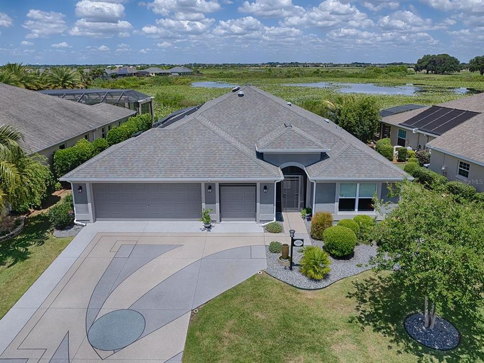 BOND PAID ON THIS STUNNING 3/2 IRIS DESIGNER WITH POOL AND PRESERVE VIEW LOCATED IN THE VILLAGE OF FERNANDINA.