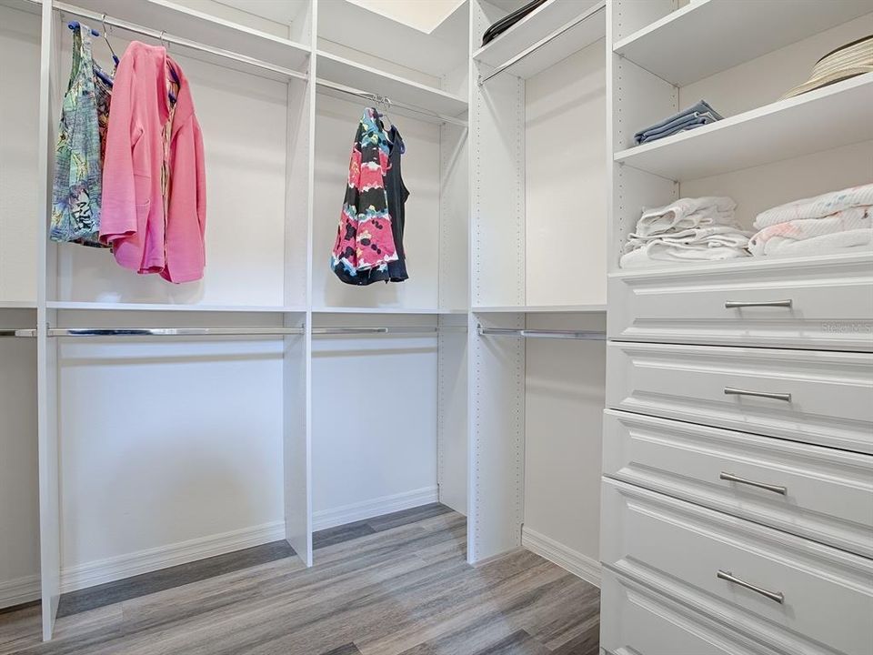 PLENTY OF HANGING SPACE, STORAGE, AND DRAWERS.