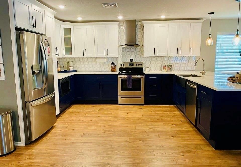 Stainless appliances with room for a butcher block
