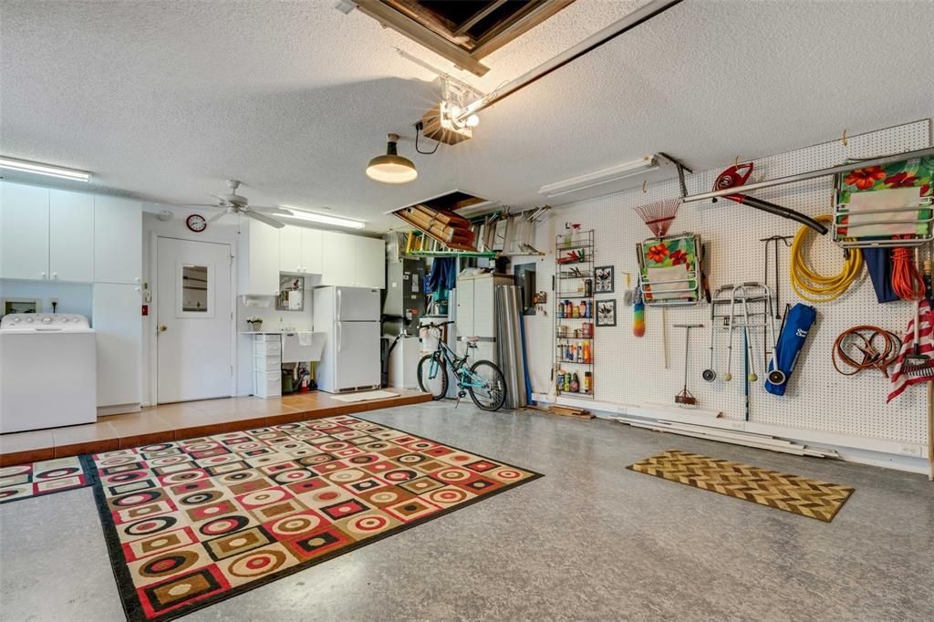 Garage with laundry and sink