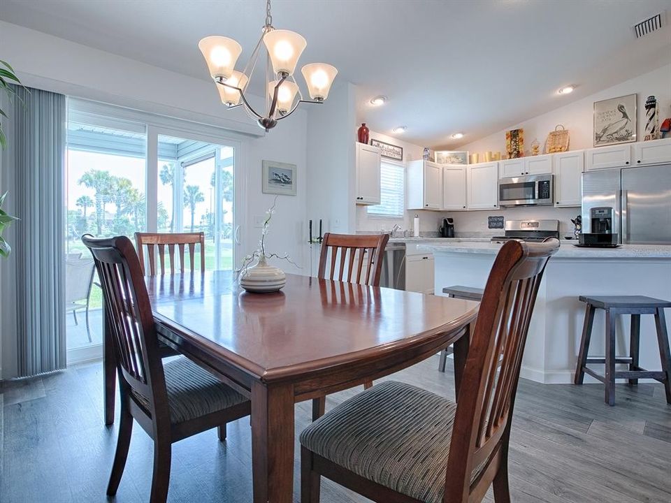 TAKE A LOOK AT THAT VIEW FROM YOUR DINING ROOM! EASY ACCESS TO THE KITCHEN.