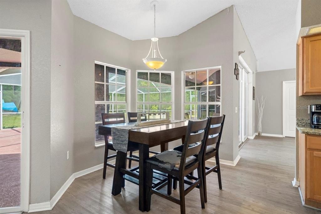 Dinette located off the Kitchen featuring bay windows.