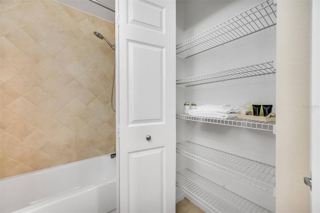Bathroom Linen closet offering tons of storage space.