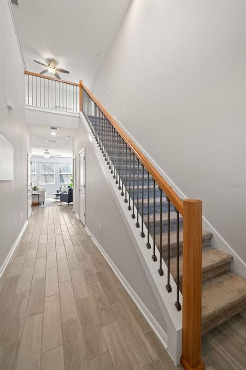 Front entryway with opened up stairwell.