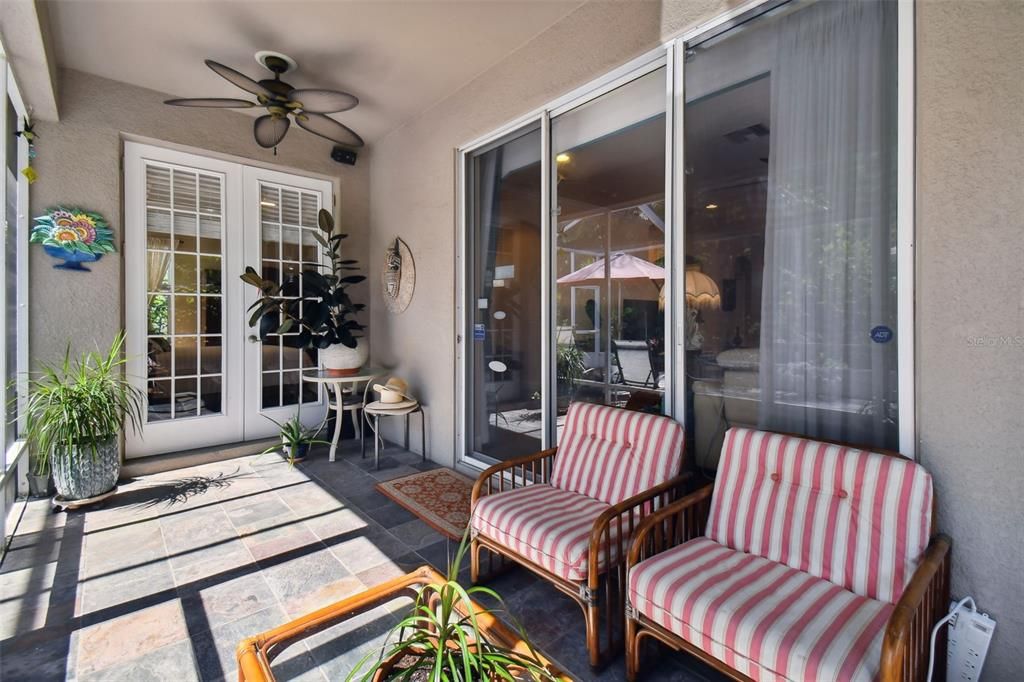 Covered Screened Patio-doors from Primary Bedroom and Living Room