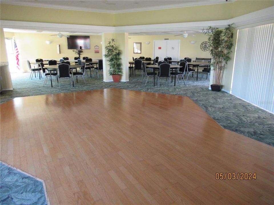SECOND CLUB HOUSE AREA AT THE POOL WHICH CAN BE RESERVED BY OWNERS LOOKS LIKE A DANCE FLOOR TO ME