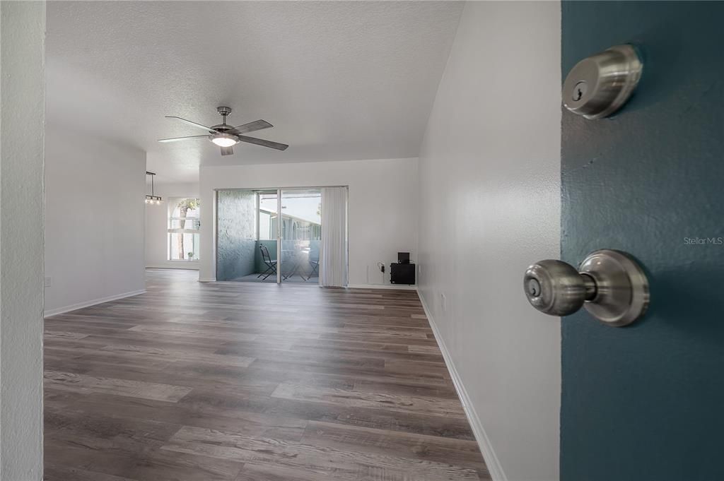 Front Entry, Living Room, & Balcony