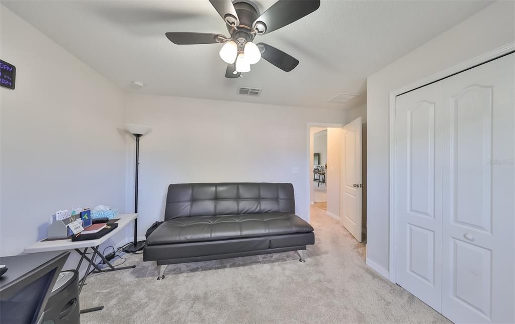 9.2 Fourth bedroom with ceiling fan