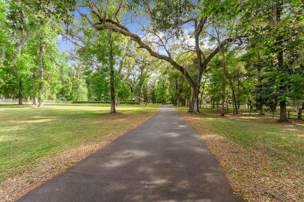 Gated 4 acres with paced driveway and fenced perimeter