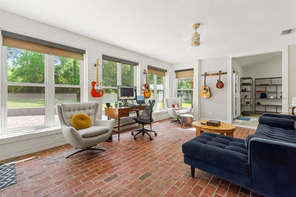 Heated and cooled Florida Room with brick floors