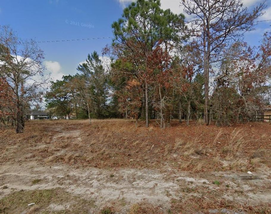 Active With Contract: $65,000 (0.58 acres)