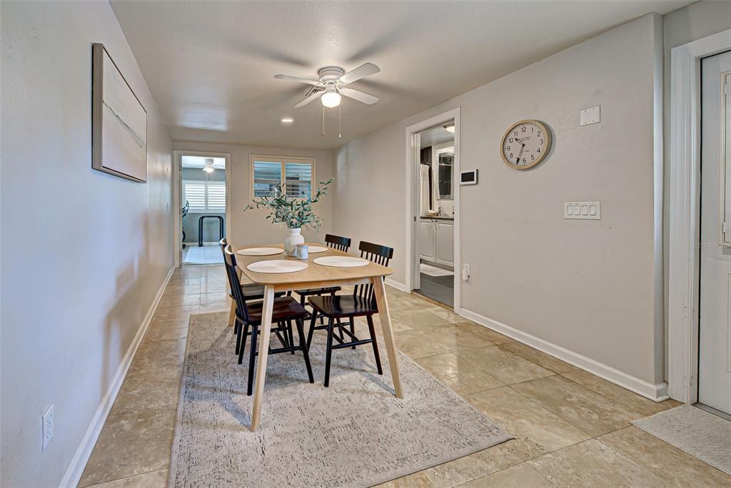 Dining room suite has a bonus room in the rear with sliding doors to the outside patio.  Laundry and 2nd bathroom