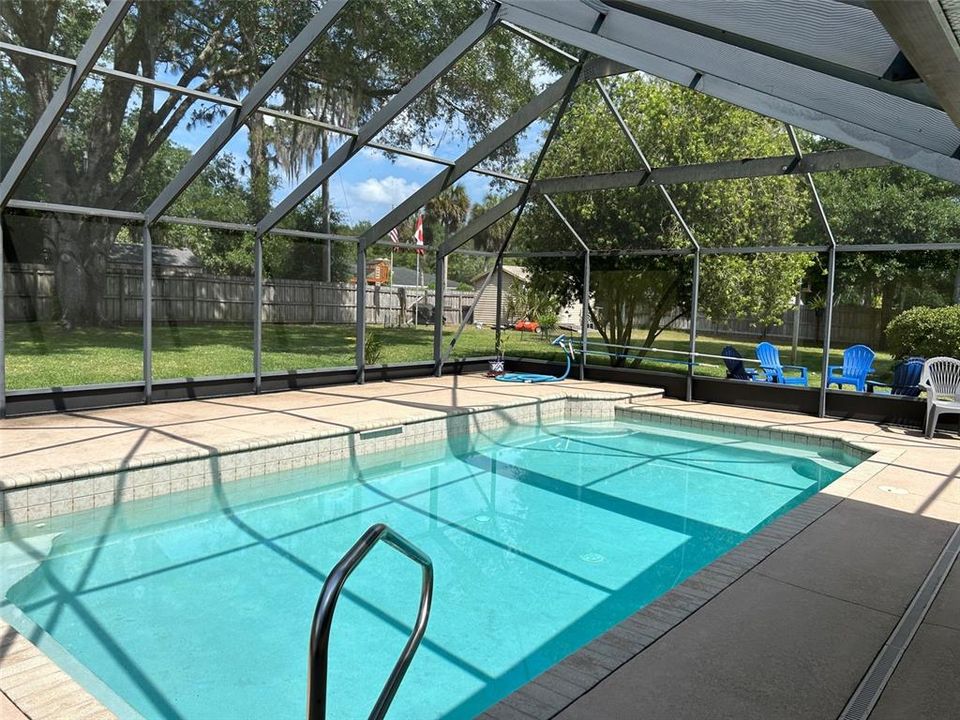Florida room with door to pool
