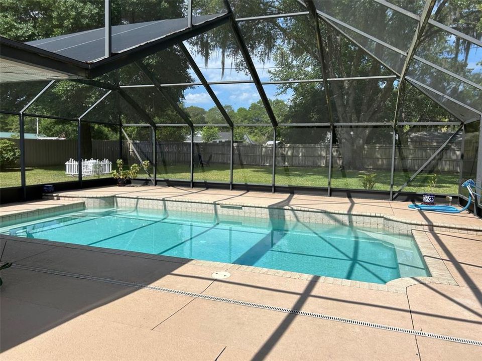 Pool area with dining space