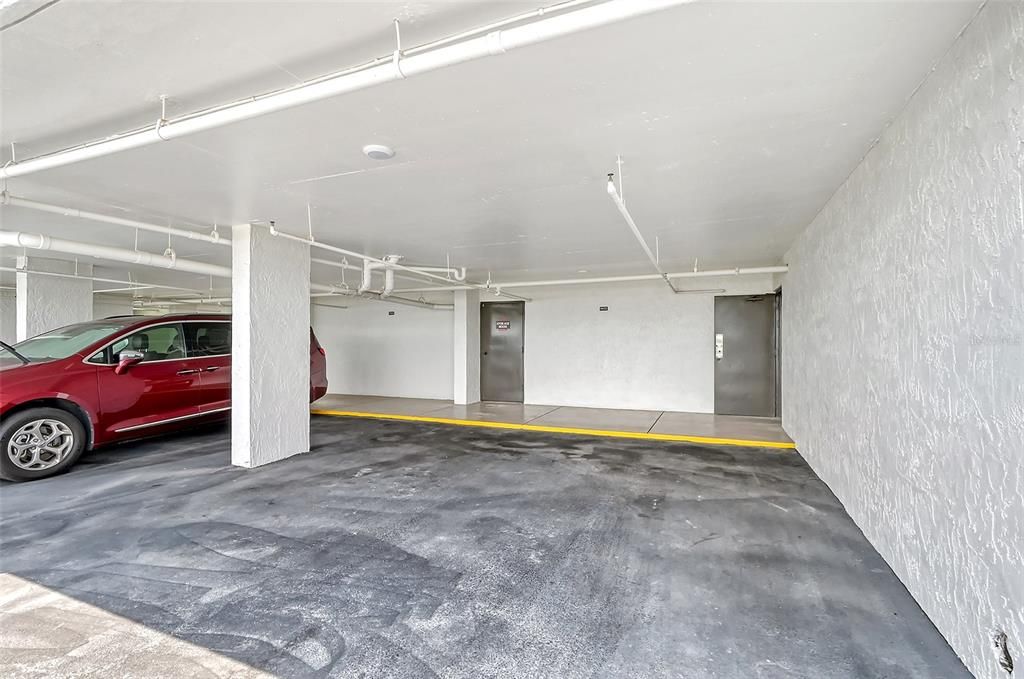 Under the building deeded parking for this unit.