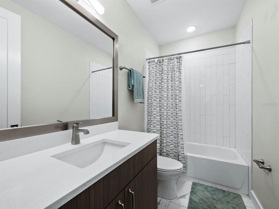 guest bath with shower/tub upper floor