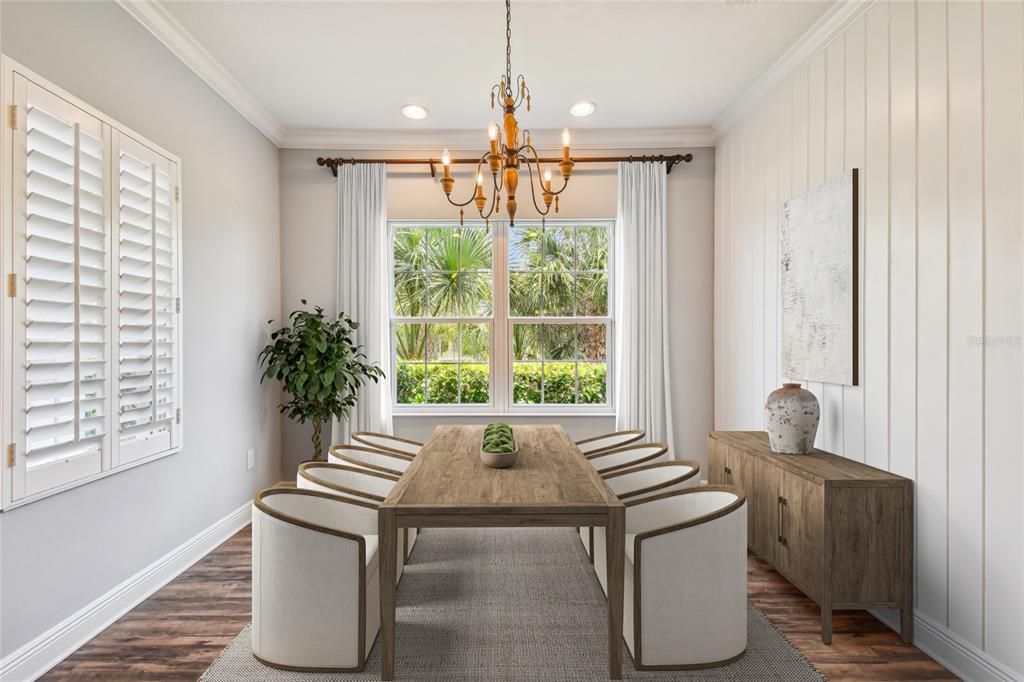 Dinner party anyone? Note Plantation shutters, shiplap accent wall, recessed lighting along with designer light fixture and recessed lighting.